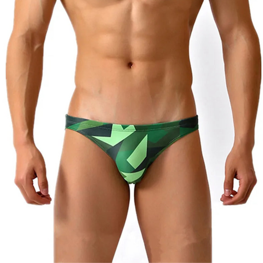 a sexy man in Men’s Military Beauty Camo Low Rise Bikini Swim Briefs - pridevoyageshop.com - gay men’s sexy swim briefs, trunks, board shorts, and bikinis