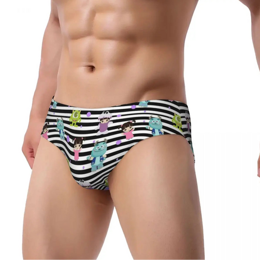 a sexy man in Men’s Monster Mischief Low Rise Swim Briefs - pridevoyageshop.com - gay men’s sexy swim briefs, trunks, board shorts, and bikinis