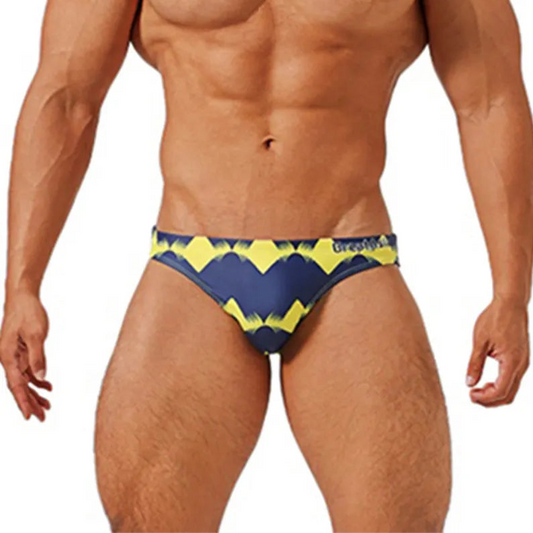 a sexy man in Men’s Neon Voltage Bikini Swim Briefs - pridevoyageshop.com - gay men’s sexy swim briefs, trunks, board shorts, and bikinis