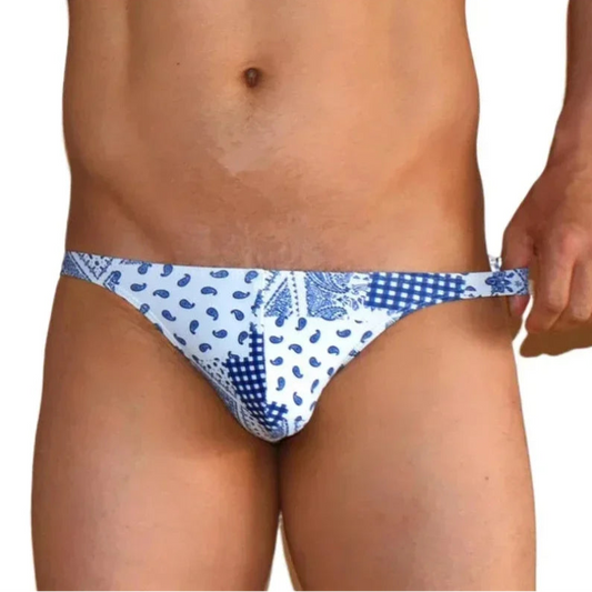 a sexy man in Men’s Patch Me Up Micro Bikini Swim Briefs - pridevoyageshop.com - gay men’s sexy swim briefs, trunks, board shorts, and bikinis