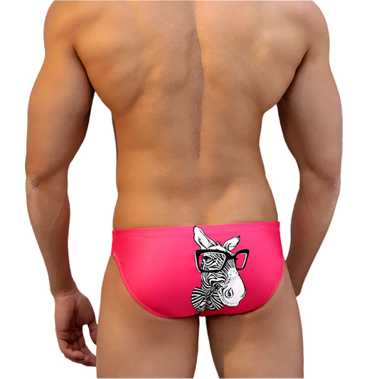 a sexy man in Men’s Pink Nerdy Zebra Swim Briefs - pridevoyageshop.com - gay men’s sexy swim briefs, trunks, board shorts, and bikinis