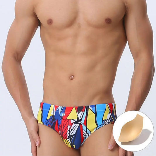a sexy man in Men’s Pop Prism Swim Briefs with pad - pridevoyageshop.com - gay men’s sexy swim briefs, trunks, board shorts, and bikinis