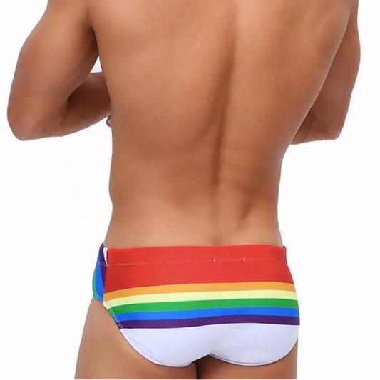 a sexy man in Men’s Pride Passion Swim Brief with Pad - pridevoyageshop.com - gay men’s sexy swim briefs, trunks, board shorts, and bikinis
