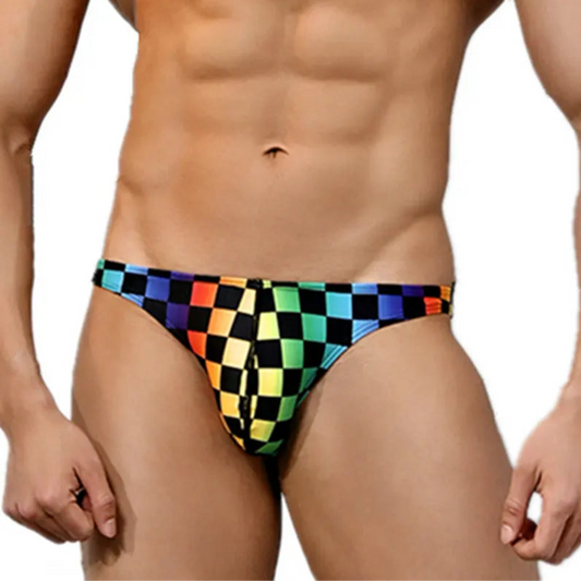 a sexy man in Men’s Pride Pit Stop Rainbow Swim Briefs - pridevoyageshop.com - gay men’s sexy swim briefs, trunks, board shorts, and bikinis