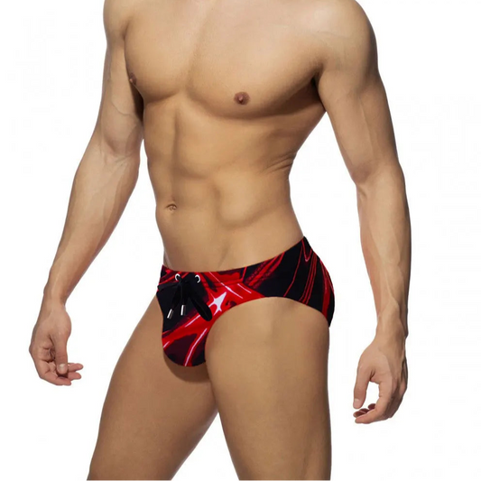 a sexy man in Men’s Redline Surge Swim Briefs - pridevoyageshop.com - gay men’s sexy swim briefs, trunks, board shorts, and bikinis
