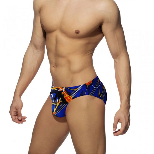 a sexy man in Men’s Sea Lava Swim Briefs - pridevoyageshop.com - gay men’s sexy swim briefs, trunks, board shorts, and bikinis