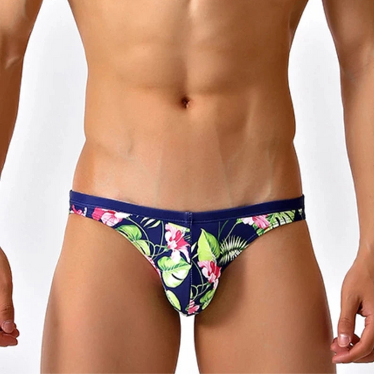 a sexy man in Men’s Secret Garden Swim Briefs - pridevoyageshop.com - gay men’s sexy swim briefs, trunks, board shorts, and bikinis