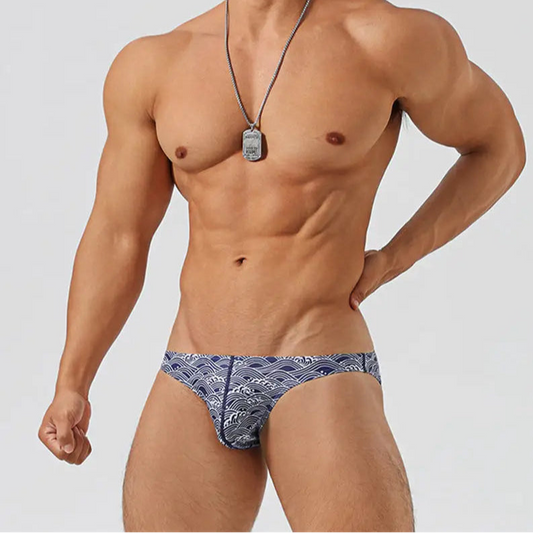 a sexy man in Men’s Tidal Tease Swim Briefs - pridevoyageshop.com - gay men’s sexy swim briefs, trunks, board shorts, and bikinis