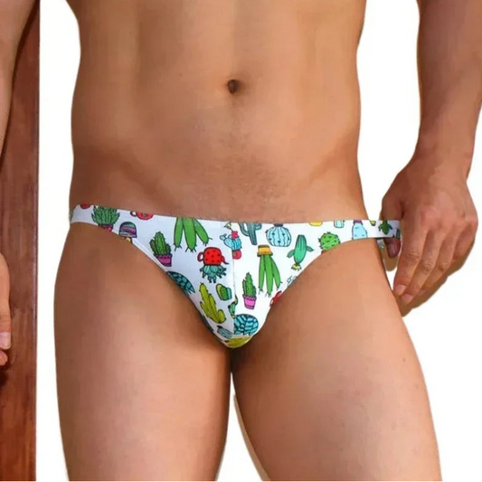 a sexy man in Men’s Wild & Thorny Bikini Swim Briefs - pridevoyageshop.com - gay men’s sexy swim briefs, trunks, board shorts, and bikinis