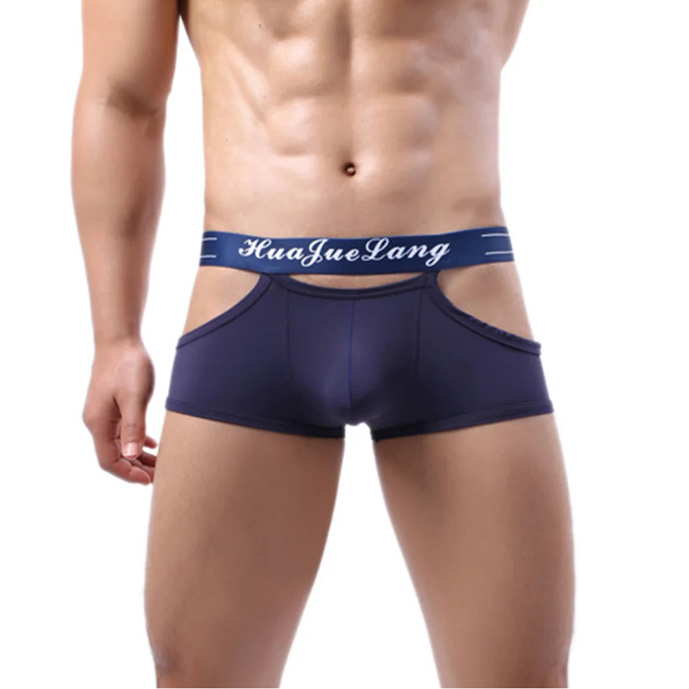 a sexy man in Sapphire Hollow Tease Cutout Boxer Briefs - pridevoyageshop.com - gay men’s thongs, boxers, briefs and jockstraps