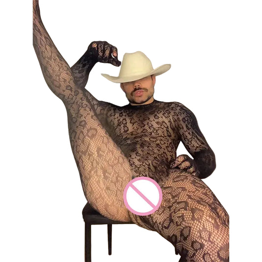 a sexy man in a black snakeskin-lace catsuit with sheer reptile-pattern mesh, body-hugging silhouette and teasing cutouts – pridevoyageshop.com – gay men’s harness, lingerie and fetish wear