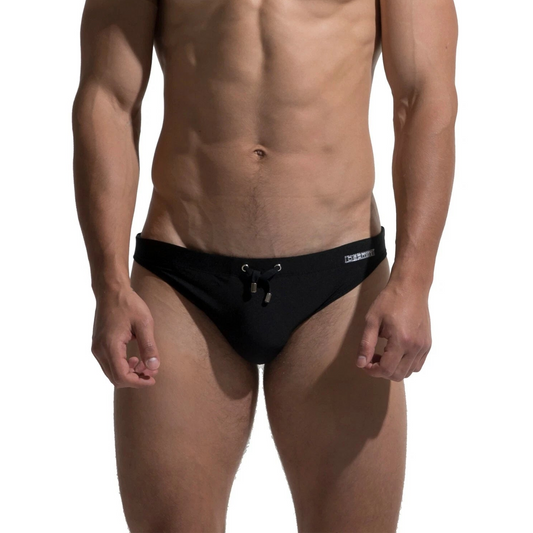 a sexy man in black Desmiit Men’s After Hours Aquatics Briefs - pridevoyageshop.com - gay men’s sexy swim briefs, trunks, board shorts, and bikinis
