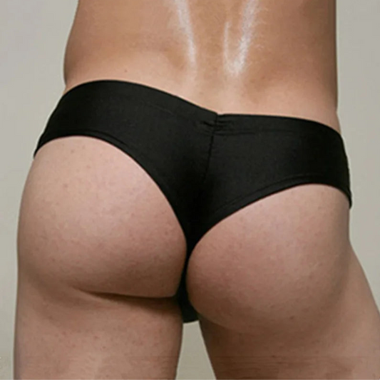 a sexy man in black Men’s Booty Drop Low-Rise Swim Briefs - pridevoyageshop.com - gay men’s sexy swim briefs, trunks, board shorts, and bikinis