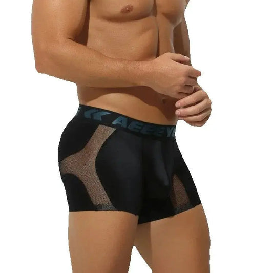 a sexy man in black Men’s Drama Mesh Boxer Briefs – pridevoyageshop.com – gay men’s sexy swim briefs, trunks, board shorts, and bikinis