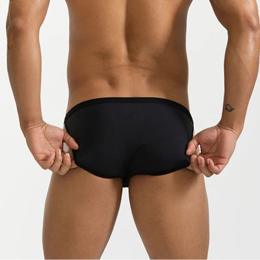 a sexy man in black Men’s Leashed at the Pool Swim Briefs - pridevoyageshop.com - gay men’s sexy swim briefs, trunks, board shorts, and bikinis