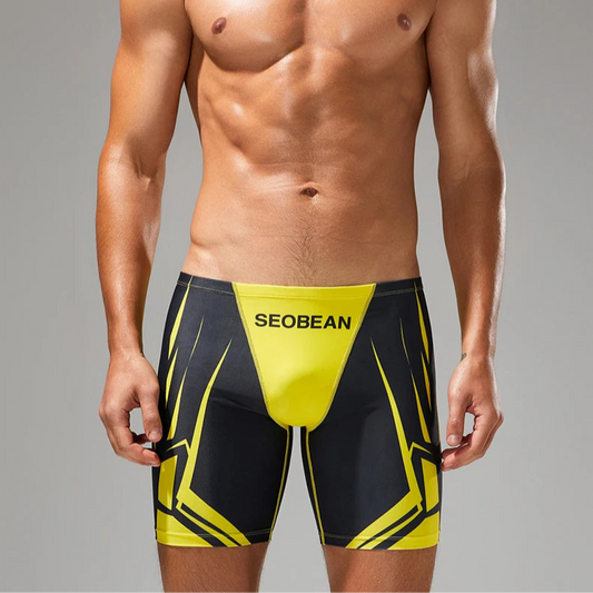 a sexy man in black Men’s Volt Strike Vortex Compression Swim Shorts – pridevoyageshop.com – gay men’s sexy swim briefs, trunks, board shorts, and bikinis
