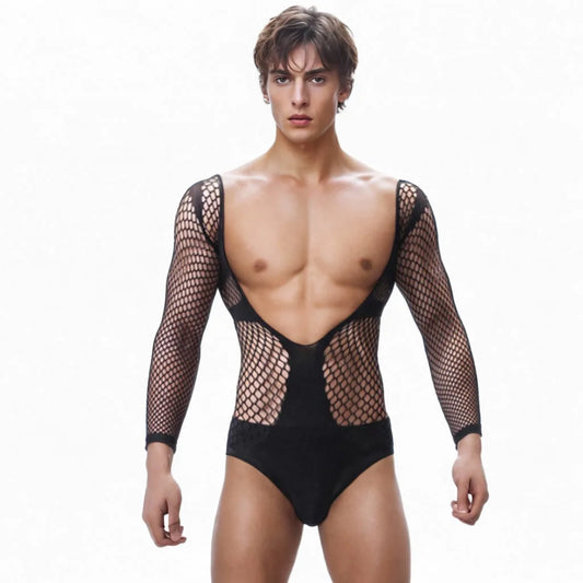 a sexy man in black fishnet teddy with open chest and thong cut showing bold dual-mood aesthetic – pridevoyageshop.com – gay men’s harness, lingerie and fetish wear