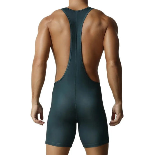 a sexy man in blackish green Men’s First-String Shield Singlet – pridevoyageshop.com – gay men’s harness, lingerie and fetish wear