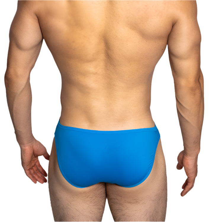 a sexy man in blue DM Men’s “Sex Boy” Side-Strap Brief - pridevoyageshop.com - gay men’s thongs, boxers, briefs and jockstraps