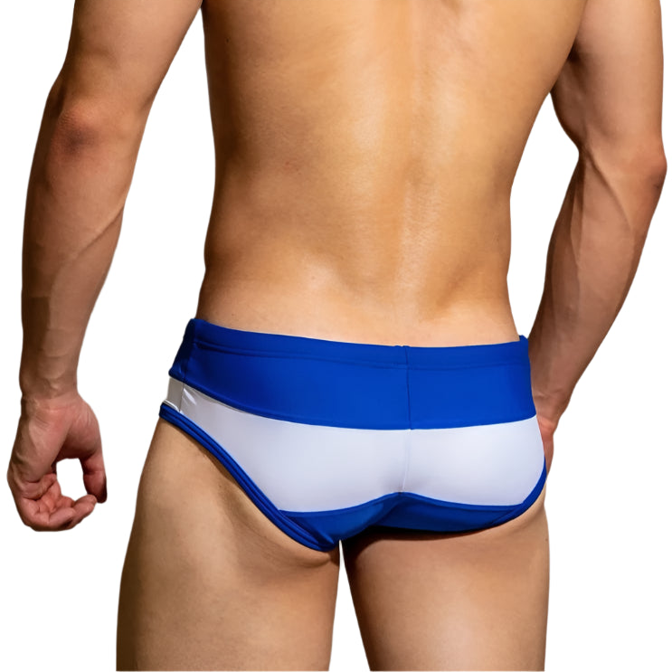 a sexy man in blue DM Men’s Side Hustle Swim Briefs - pridevoyageshop.com - gay men’s thongs, boxers, briefs and jockstraps