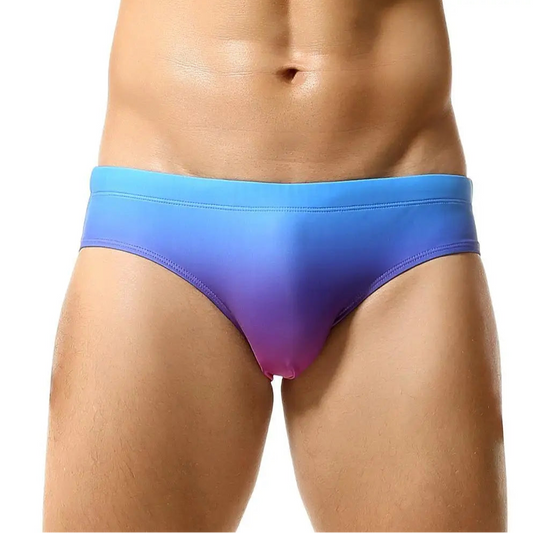 a sexy man in blue Men’s Candy Cove Swim Briefs - pridevoyageshop.com - gay men’s sexy swim briefs, trunks, board shorts, and bikinis