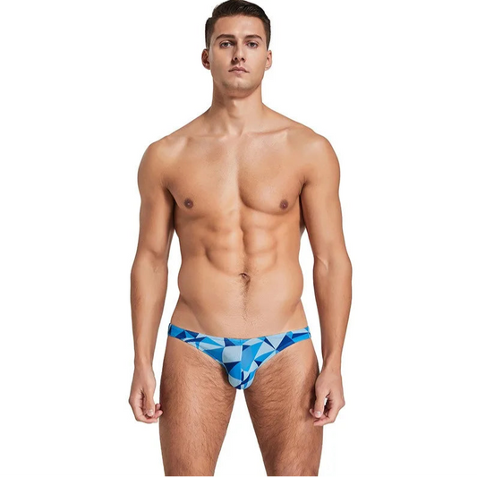 a sexy man in blue Men’s Prism Tease Swim Briefs - pridevoyageshop.com - gay men’s sexy swim briefs, trunks, board shorts, and bikinis