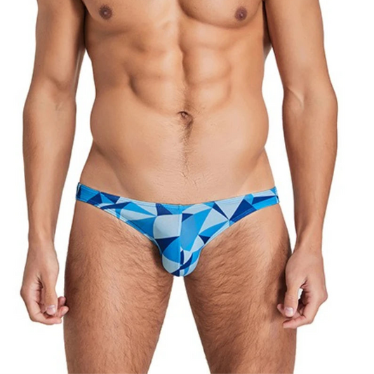 a sexy man in blue Men’s Prism Tease Swim Briefs - pridevoyageshop.com - gay men’s sexy swim briefs, trunks, board shorts, and bikinis