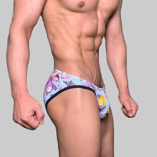 a sexy man in blue Men’s Toon Riot Swim Bikini Briefs – pridevoyageshop.com – gay men’s sexy swim briefs, trunks, board shorts, and bikinis