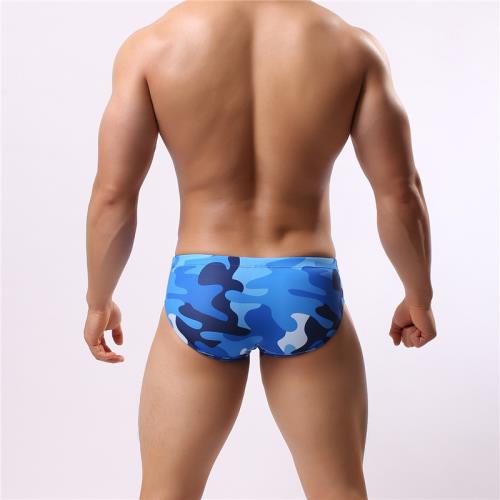 a sexy man in blue camo Men’s Camo Carnal Low Rise Swim Briefs - pridevoyageshop.com - gay men’s sexy swim briefs, trunks, board shorts, and bikinis