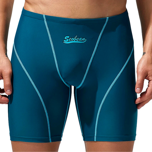 a sexy man in blue green Men’s Code Lock Speed Vortex Compression Swim Shorts – pridevoyageshop.com – gay men’s sexy swim briefs, trunks, board shorts, and bikinis