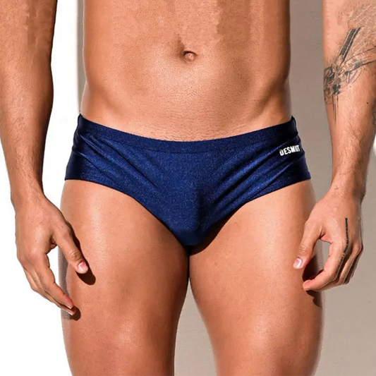 a sexy man in dark blue Desmiit Men’s Pouch Devil Low Rise Swim Briefs - pridevoyageshop.com - gay men’s sexy swim briefs, trunks, board shorts, and bikinis