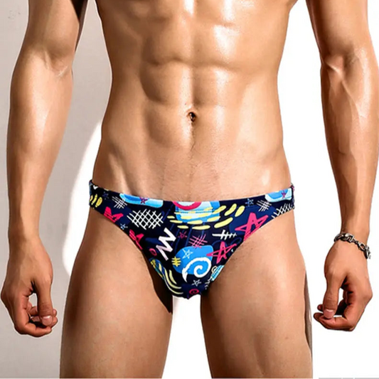 a sexy man in dark blue Men’s Street Play Swimmers - pridevoyageshop.com - gay men’s sexy swim briefs, trunks, board shorts, and bikinis