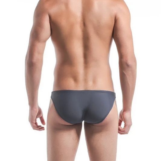 a sexy man in dark gray Men’s Power Split Swim Briefs - pridevoyageshop.com - gay men’s sexy swim briefs, trunks, board shorts, and bikinis