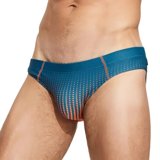 a sexy man in dark green Men’s Spank Me Dotty Swim Briefs - pridevoyageshop.com - gay men’s sexy swim briefs, trunks, board shorts, and bikinis