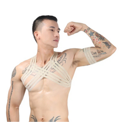 a sexy man in gold Men’s The Lewk Chest Harness Set – pridevoyageshop.com – gay men’s harness, lingerie and fetish wear