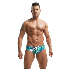 a sexy man in jungle Men’s Jungle Juice Swim Briefs with Pad - pridevoyageshop.com - gay men’s sexy swim briefs, trunks, board shorts, and bikinis