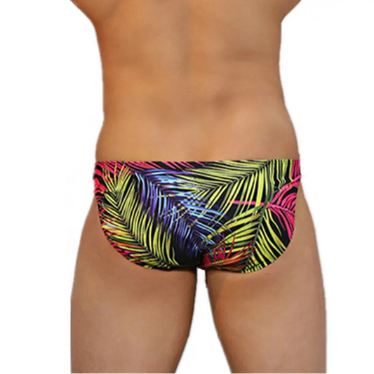 a sexy man in neon Men’s Jungle Jock Fantasy Low Rise Swim Briefs - pridevoyageshop.com - gay men’s sexy swim briefs, trunks, board shorts, and bikinis