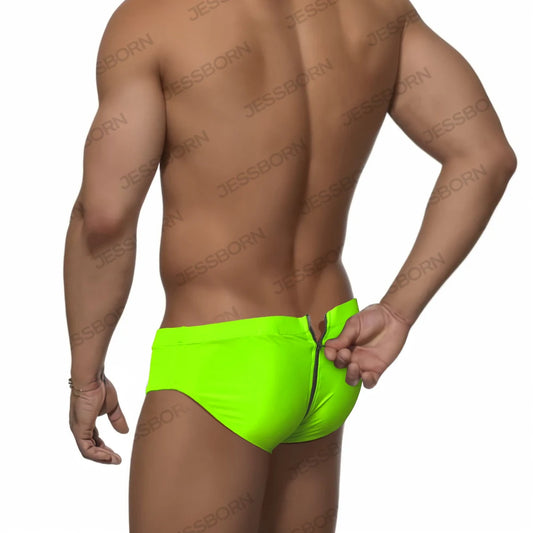 a sexy man in neon green Men's Unzip Me Daddy Swim Briefs - pridevoyageshop.com - gay men’s sexy swim briefs, trunks, board shorts, and bikinis