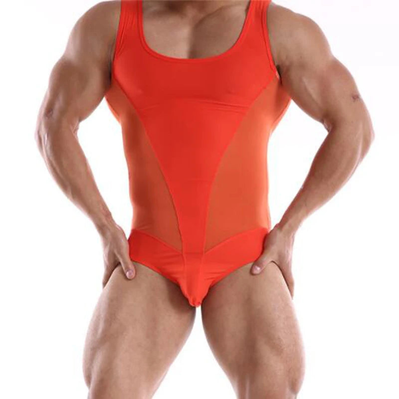 a sexy man in orange Adonis V-Contour Mesh Singlet, tight sheer torso fit, V-shape contour lines, sculpted chest, athletic fetish vibe – pridevoyageshop.com – gay men’s harness, lingerie and fetish wear