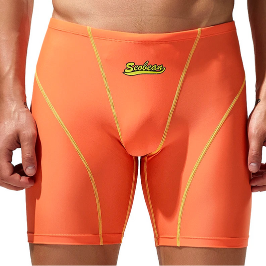 a sexy man in orange Men’s Code Lock Speed Vortex Compression Swim Shorts – pridevoyageshop.com – gay men’s sexy swim briefs, trunks, board shorts, and bikinis