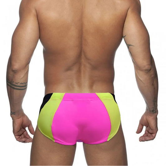a sexy man in pink Men’s Colorblock Bulge-Boost Swim Briefs - pridevoyageshop.com - gay men’s sexy swim briefs, trunks, board shorts, and bikinis