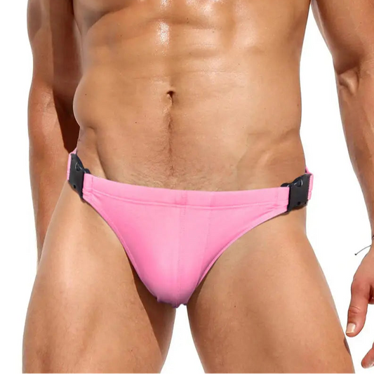 a sexy man in pink Men’s Unclip Me Double Buckle Swim Briefs - pridevoyageshop.com - gay men’s sexy swim briefs, trunks, board shorts, and bikinis