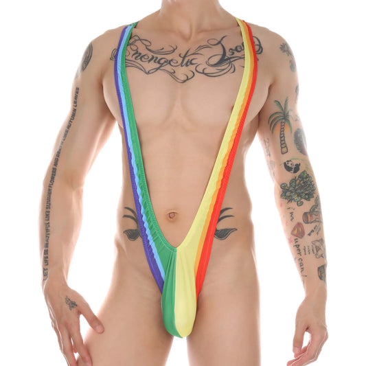 a sexy man in rainbow Maximum Rainbow sling-thong, ultra-low micro cut, bold gay pride colors, exposed chest and back, extreme bulge pouch and thong back – pridevoyageshop.com – gay men’s harness, lingerie and fetish wear
