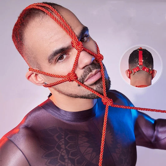 a sexy man in red Men’s Kinbaku Head Harness – pridevoyageshop.com – gay men’s harness, lingerie and fetish wear