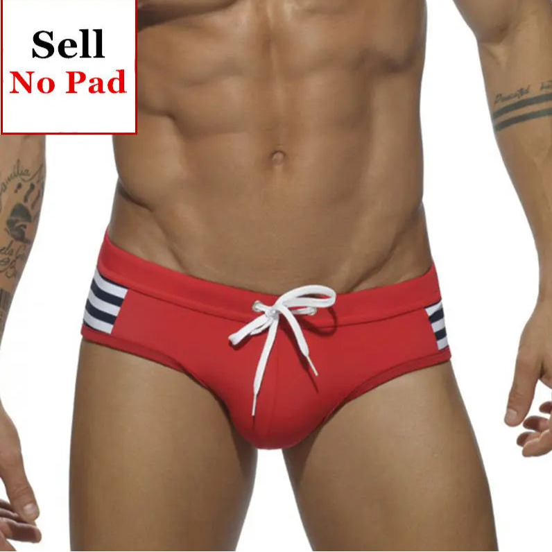 a sexy man in red Men’s Striped Stallion Low Rise Swim Briefs - pridevoyageshop.com - gay men’s sexy swim briefs, trunks, board shorts, and bikinis