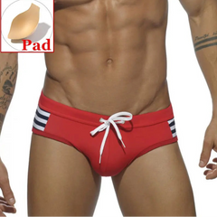 a sexy man in red Men’s Striped Stallion Low Rise Swim Briefs with pad - pridevoyageshop.com - gay men’s sexy swim briefs, trunks, board shorts, and bikinis