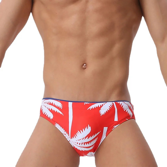 a sexy man in red Men’s Sway My Way Swim Briefs - pridevoyageshop.com - gay men’s sexy swim briefs, trunks, board shorts, and bikinis