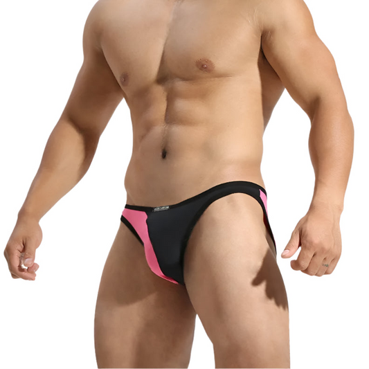 a sexy man in rose red Men’s Slick Split-Panel Swim Briefs - pridevoyageshop.com - gay men’s sexy swim briefs, trunks, board shorts, and bikinis