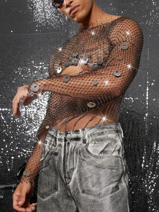 a sexy man in silver Men’s Glimmer Shatter Mesh Bolero – pridevoyageshop.com – gay men’s harness, lingerie and fetish wear