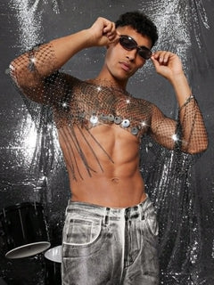 a sexy man in silver Men’s Glimmer Shatter Mesh Bolero – pridevoyageshop.com – gay men’s harness, lingerie and fetish wear
